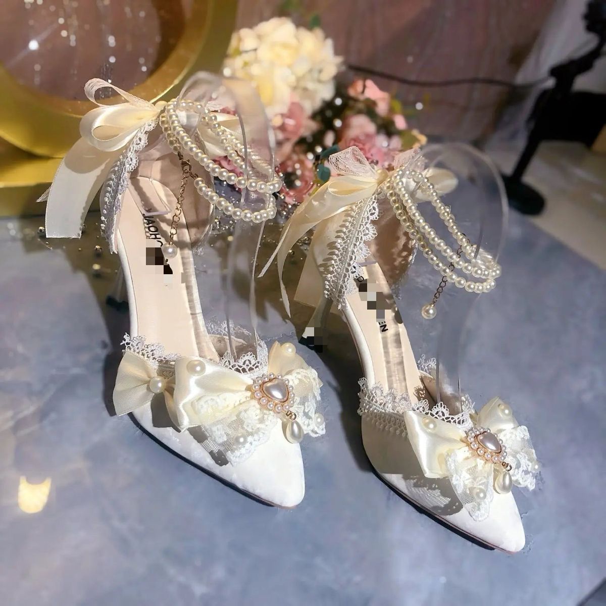 Zapatilla de princesa con perlas