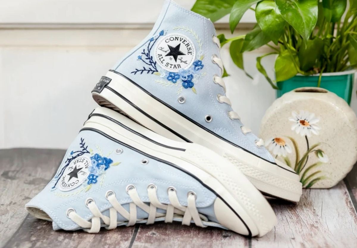 Tennis shoes with blue flowers