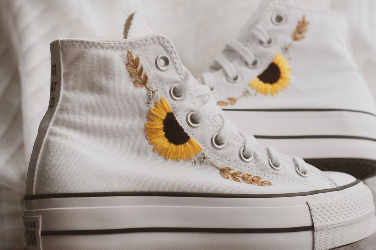 Tennis shoes with embroidered sunflowers